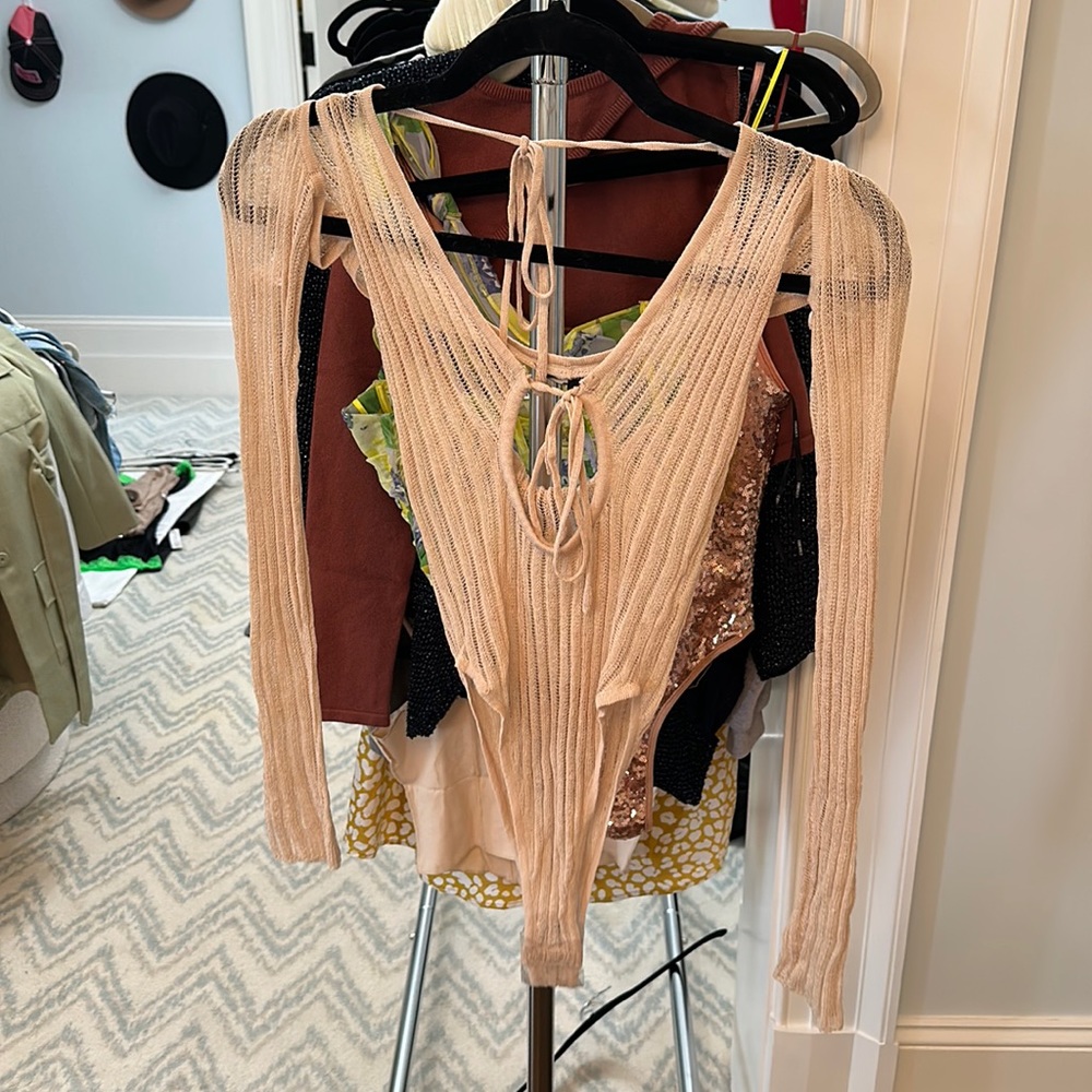 Knit bodysuit with matching sleeve